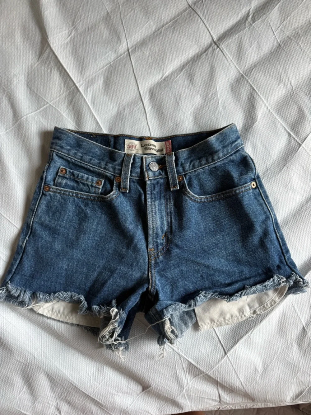 Levi's Frayed Hem Denim Shorts
